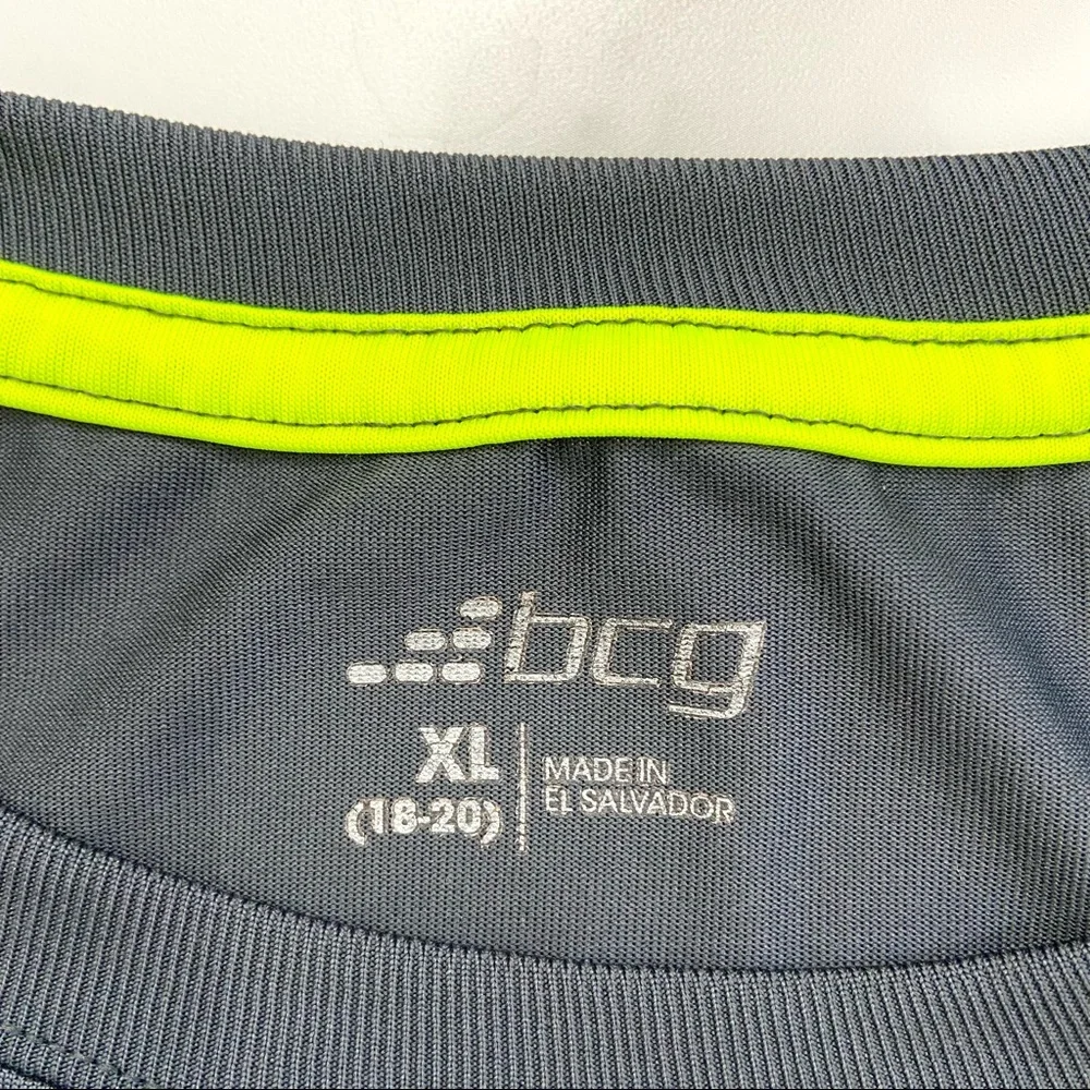 It’s grey long sleeve shit.  Size 18/ 20 (large).  Brand is bcg.